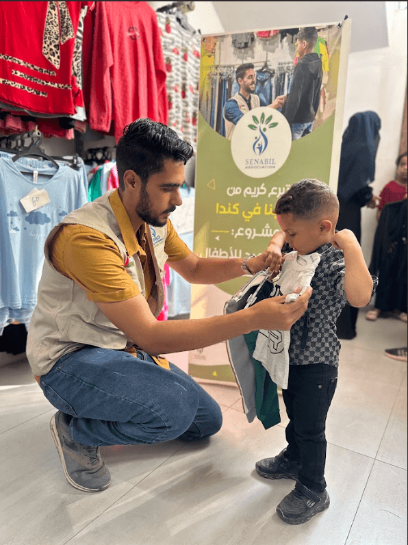Distribution of Clothing for Children during Eid Al-Adha despite War and Harsh Conditions