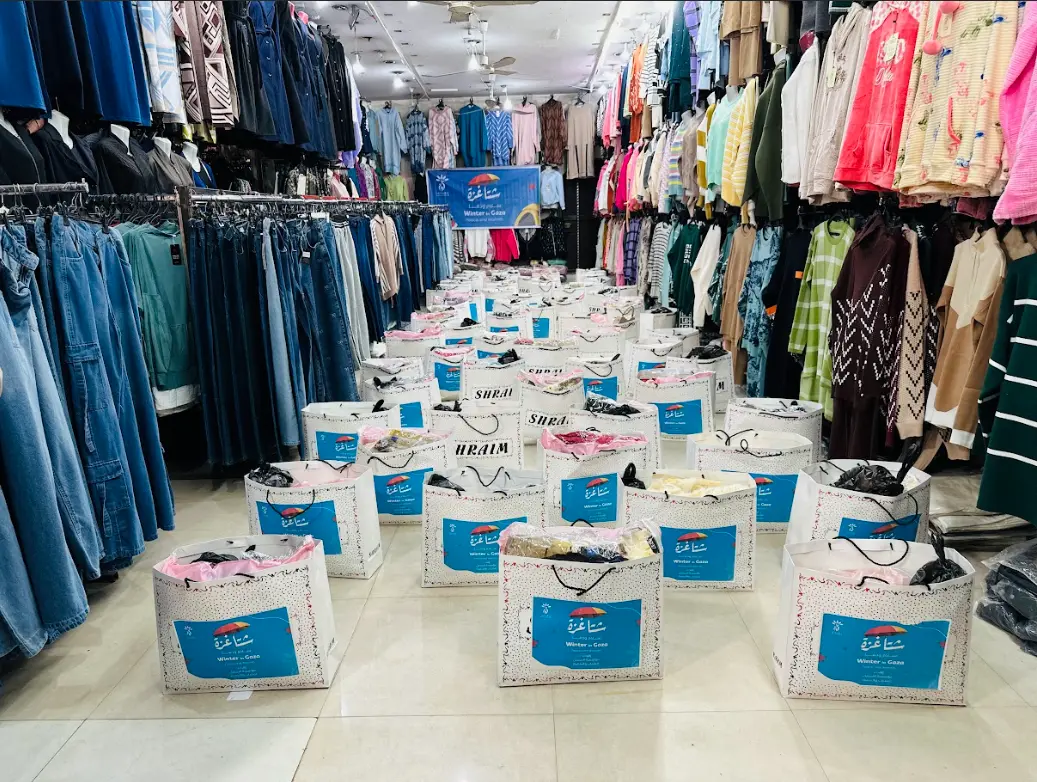Distribution of Winter Clothing for Women in Displacement Camps under the “Gaza Winter… Peace & Warmth” Campaign