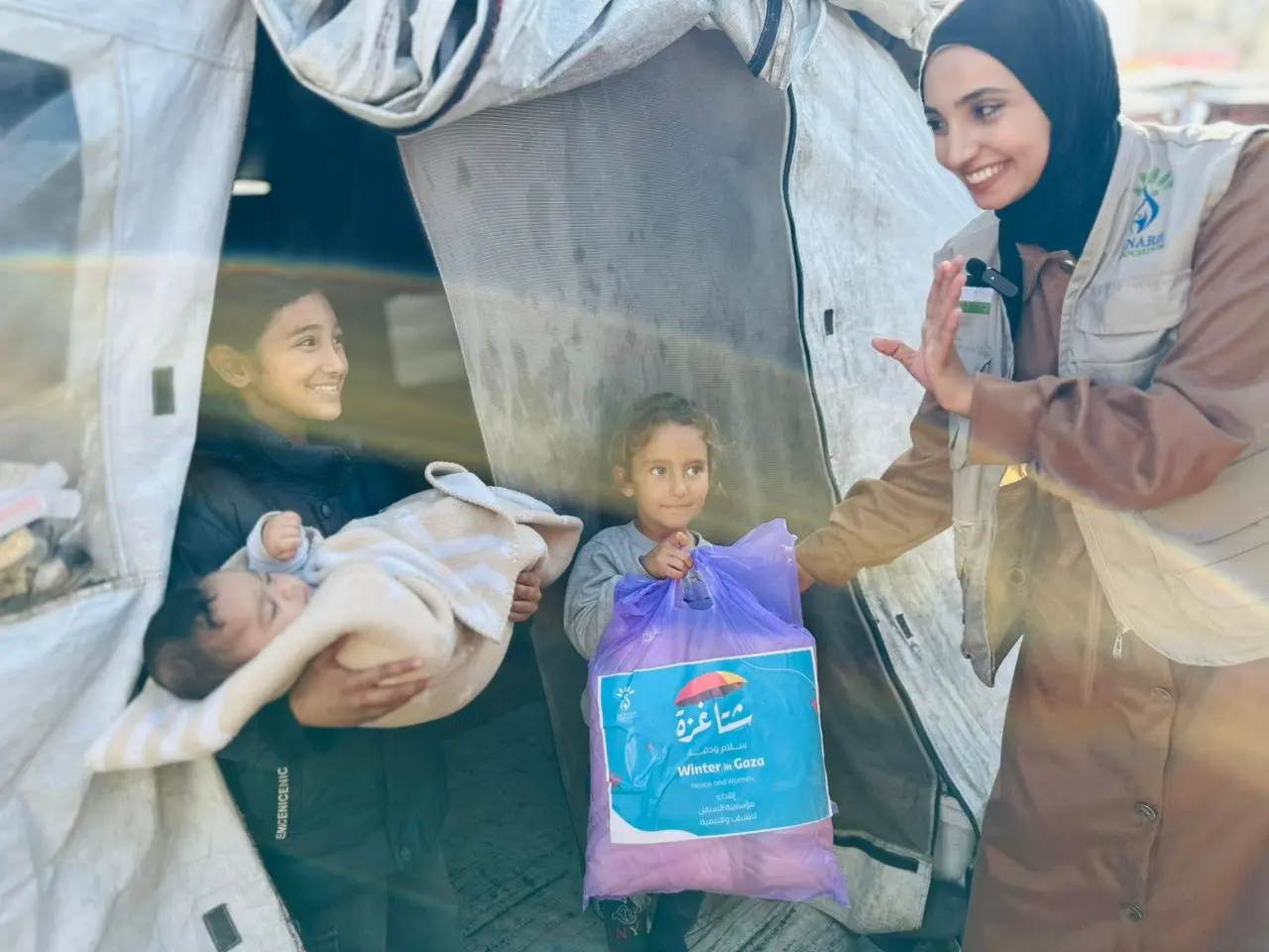 Distribution of Winter Clothing Kits for Infants under the “Gaza Winter… Peace &amp; Warmth” Campaign