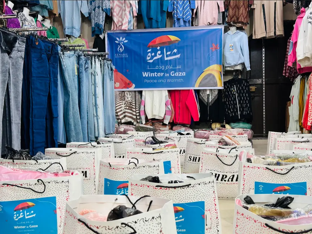 Distribution of Winter Clothing for Women in Displacement Camps under the “Gaza Winter… Peace & Warmth” Campaign